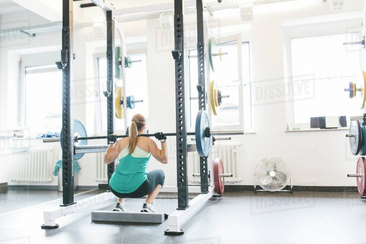 Barbell Squat met een power rack